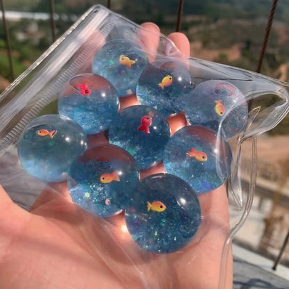 1pc/3pcs/9pcs Transparent Balls Taba Squishy Toy (fish in ball)