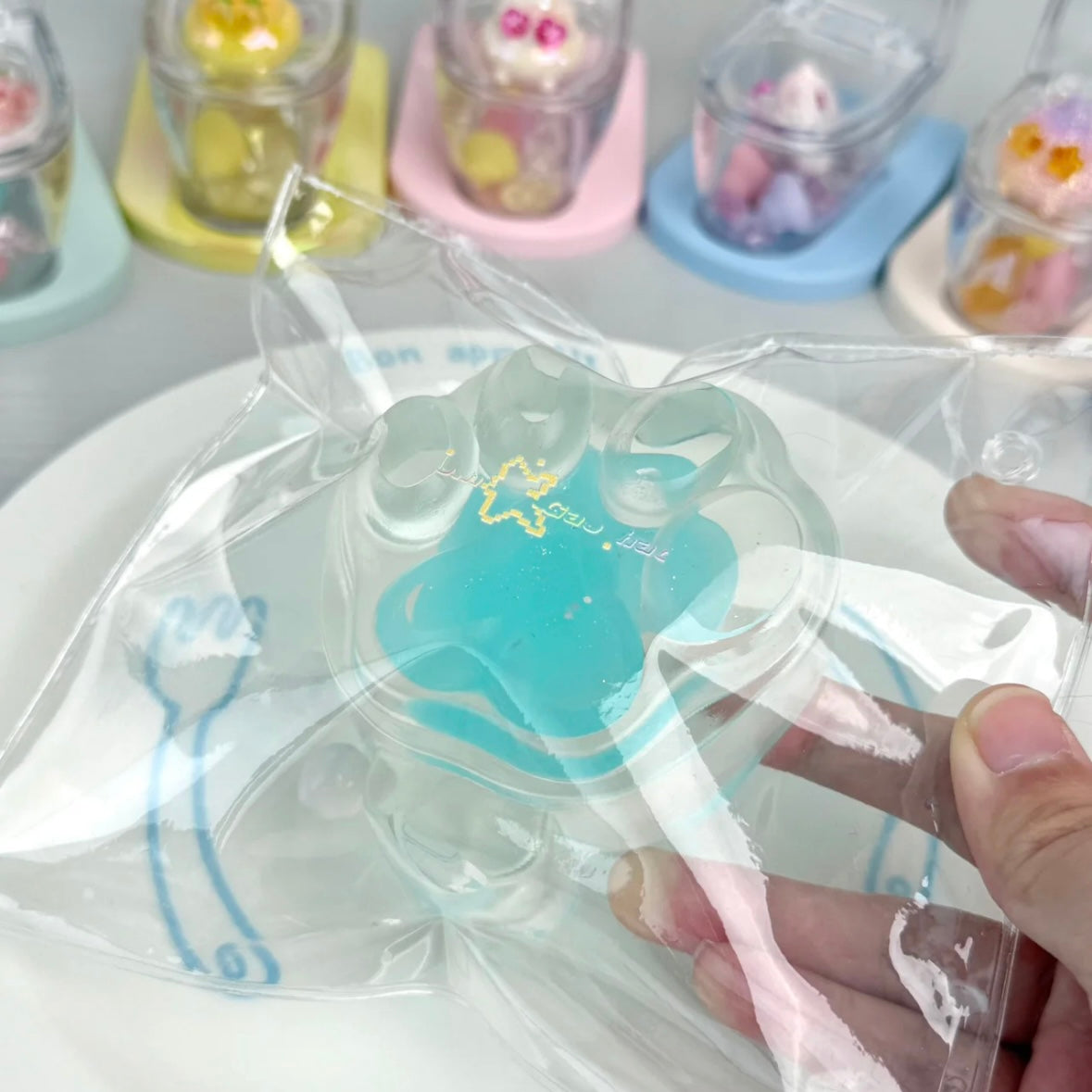 Transparent Cat's Paw Taba Squishy Toy (Liquid Squishy)